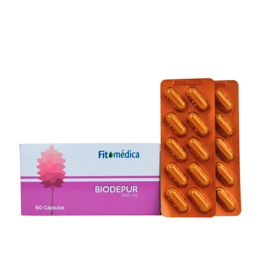La imagen muestra Biodepur, presentación en cápsulas de 500 mg de Fitomédica, junto a su caja en tonos morados y rosados con el diseño de una flor estilizada. Incluye dos blísteres con cápsulas color naranja brillante. Está formulado como desinflamatorio natural para aliviar dolores articulares, cólicos y malestares digestivos.